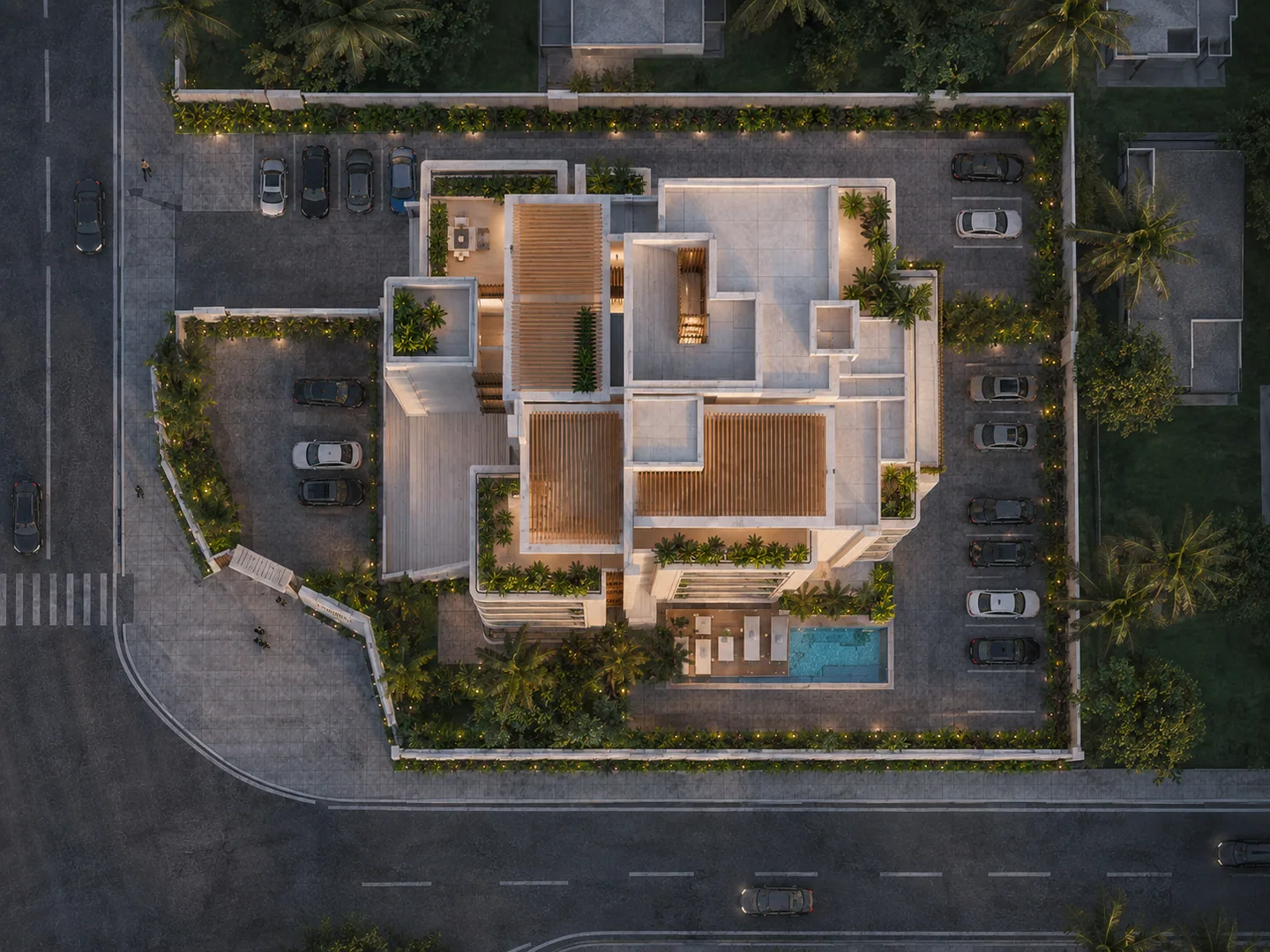 Straight-down drone top-down view of the entire property: roof terraces, pool, courtyard landscaping, parking court, and surrounding street clearly legible.
